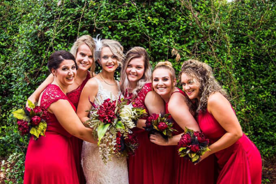 Bride and her bridesmaids in the Outdoor decorated courtyard