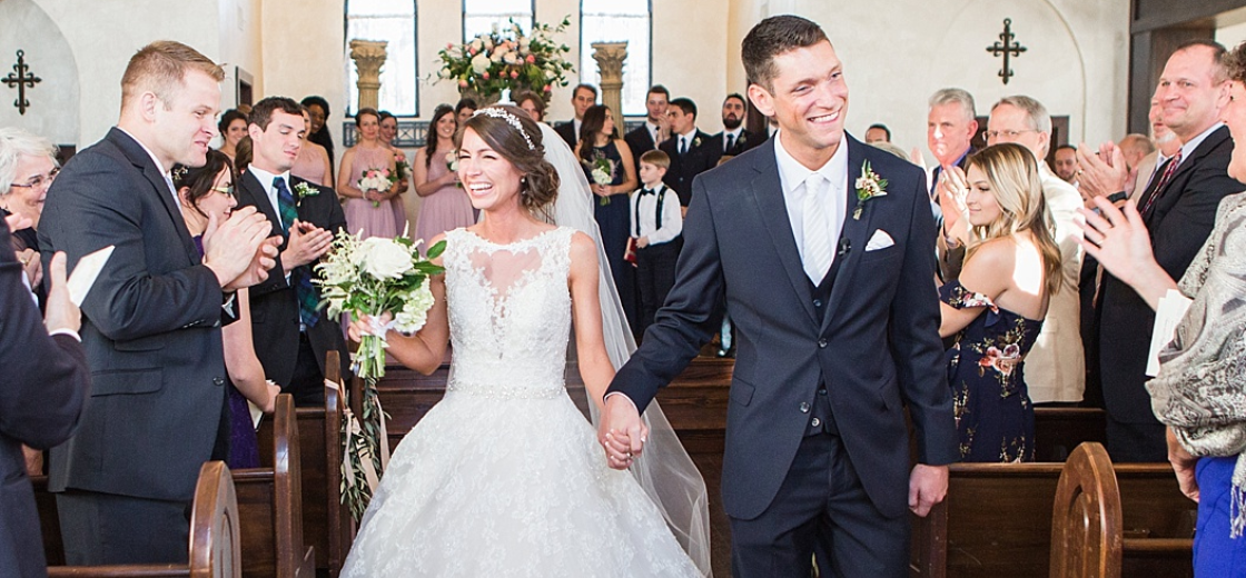 Bride and groom in historic wedding chapel